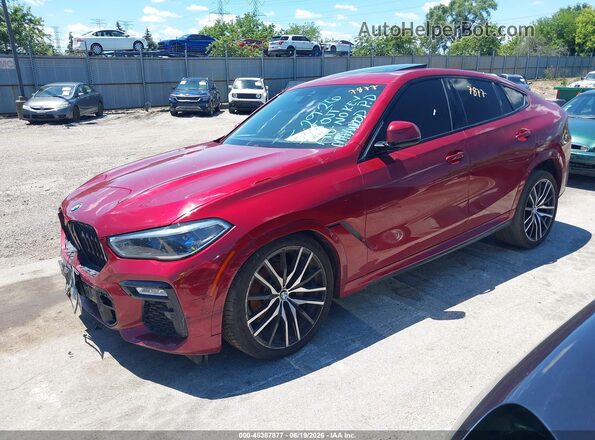 5UXCY6C06M9E36343 2021 BMW X6 Red Front left