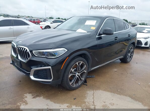 5UXCY6C06N9N23934 2022 BMW X6 Black Vista tres cuartos delantera izquierda