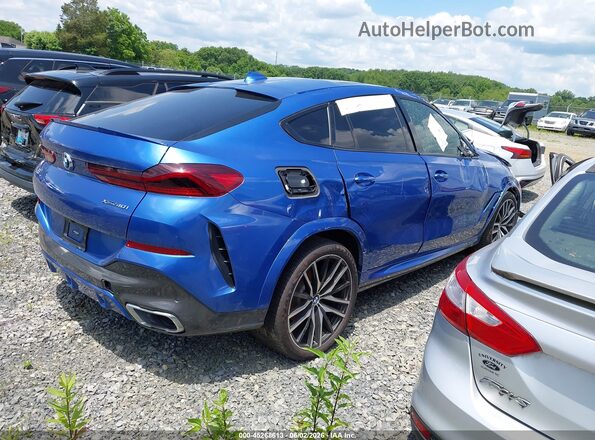 5UXCY6C07L9C66010 2020 BMW X6 Blue Trasero derecho