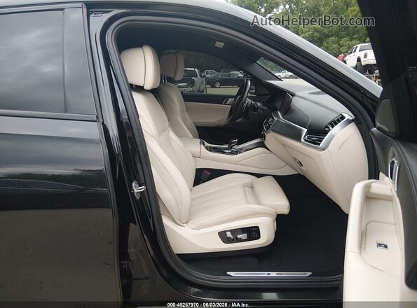 5UXCY6C08L9D00858 2020 BMW X6 Черный Вид салона спереди