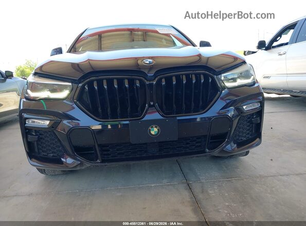 5UXCY6C0XL9C82685 2020 BMW X6 Black Սալոնի հետևի տեսք