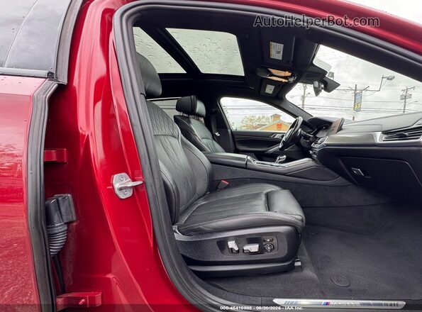 5UXCY8C09M9E51267 2021 BMW X6 Red Widok wnętrza z przodu