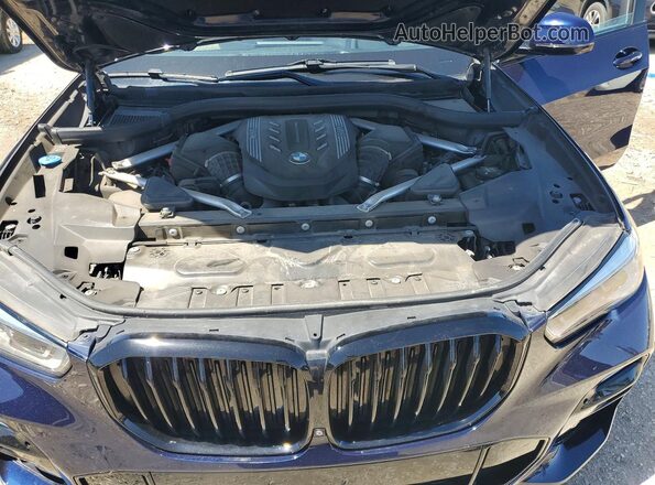 5UXJU4C00M9G77855 2021 BMW X5 Blue Engine compartment view
