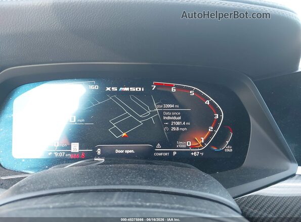 5UXJU4C09N9J27052 2022 BMW X5 Black Vista de los asientos traseros