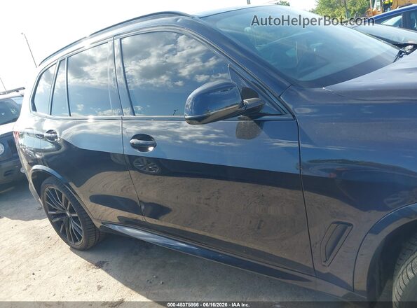 5UXJU4C09N9J27052 2022 BMW X5 Black Vista interior trasera