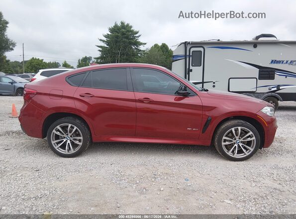 5UXKU2C32H0U29309 2017 BMW X6 Red Widok wnętrza z tyłu