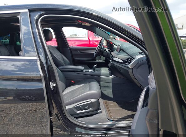 5UXKU2C50J0X49235 2018 BMW X6 Black Vista interior delantera