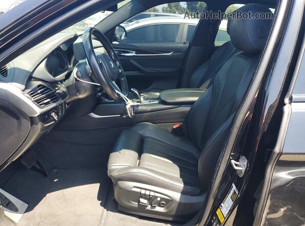 5UXKU2C54K0Z64876 2019 BMW X6 Black Vista interior delantera