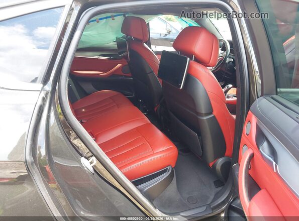 5UXKU2C58H0N84903 2017 BMW X6 Black VIN კოდის სტიკერის ხედი