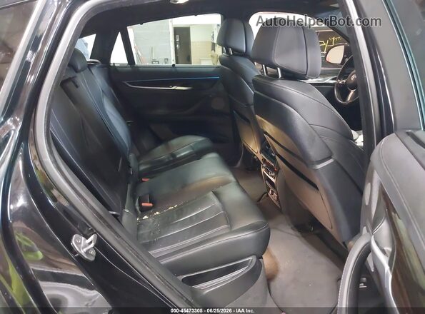 5UXKU2C58K0Z64797 2019 BMW X6 Black VIN sticker view