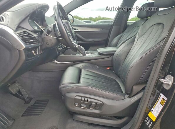 5UXKU2C5XJ0X48237 2018 BMW X6 Черный Вид салона спереди