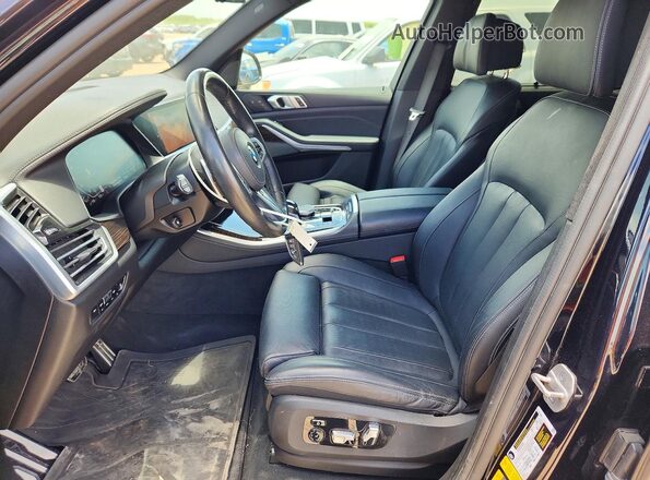 5UXTA6C08M9E52872 2021 BMW X5 Black Front interior view