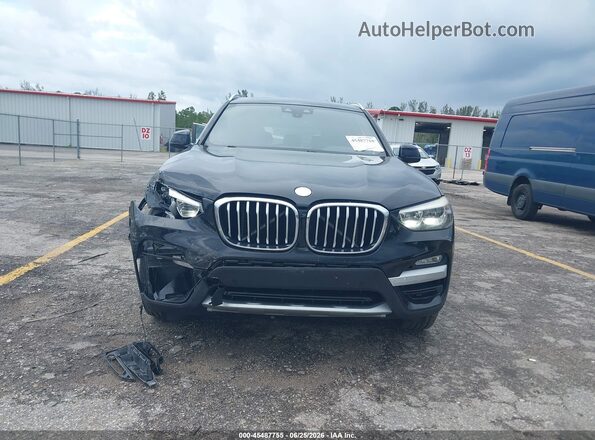 5UXTR7C51KLF28698 2019 BMW X3 Black Vista interior trasera