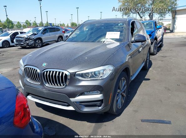 5UXTR7C57KLF24090 2019 BMW X3 Gray ხელსაწყოთა პანელის ხედი