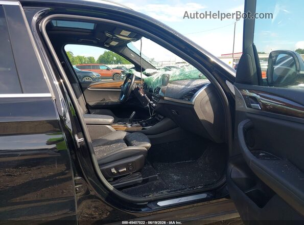 5UXTR7C57KLR44431 2019 BMW X3 Black Vista interior delantera