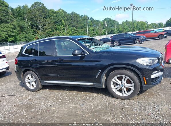 5UXTR7C57KLR44431 2019 BMW X3 Black Vista interior trasera
