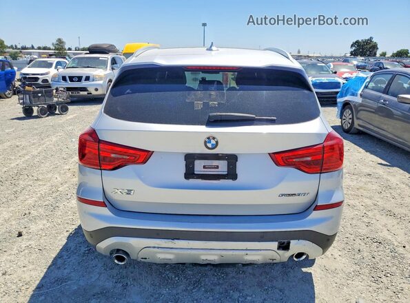 5UXTR7C5XKLF29008 2019 BMW X3 Silver Rear view