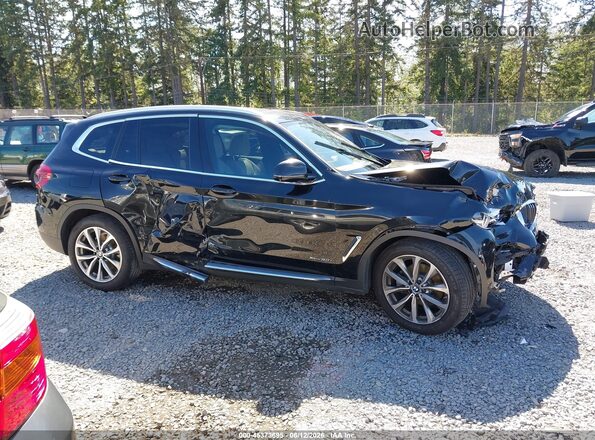 5UXTR9C50JLC75755 2018 BMW X3 Black Rear interior view