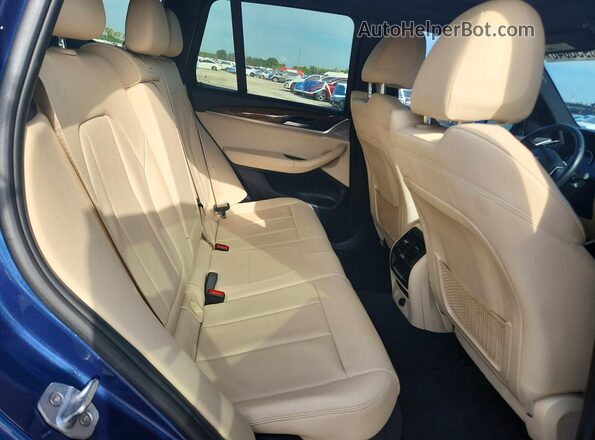 5UXTR9C53KLE18974 2019 BMW X3 Blue Rear interior view