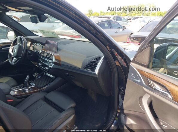 5UXTR9C53KLP93616 2019 BMW X3 Black Front interior view