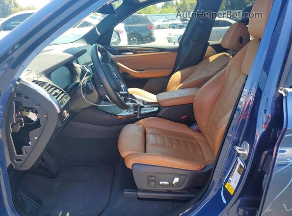 5UXTY3C00M9G33460 2021 BMW X3 Blue Vista interior delantera