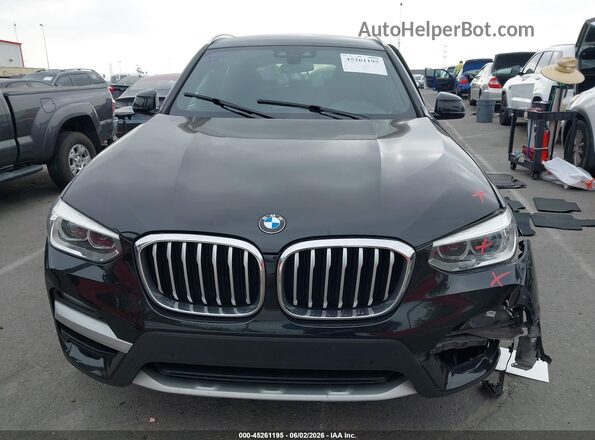 5UXTY3C02M9E37228 2021 BMW X3 Black Սարքավորումների վահանակի տեսք