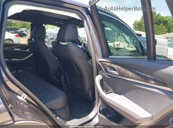 5UXTY3C05L9D68159 2020 BMW X3 Black Vista de la etiqueta del VIN