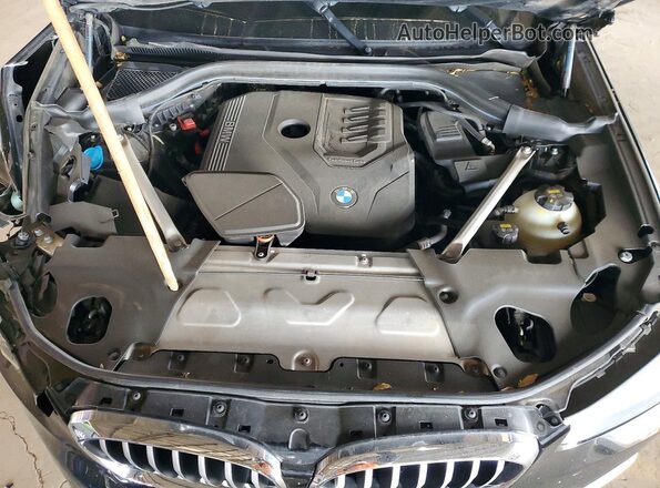 5UXTY3C06LLU72076 2020 BMW X3 Black Սալոնի հետևի տեսք