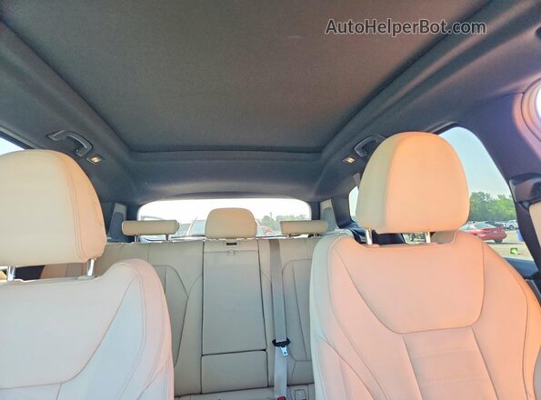 5UXTY5C00M9E37840 2021 BMW X3 Blue Rear seats view