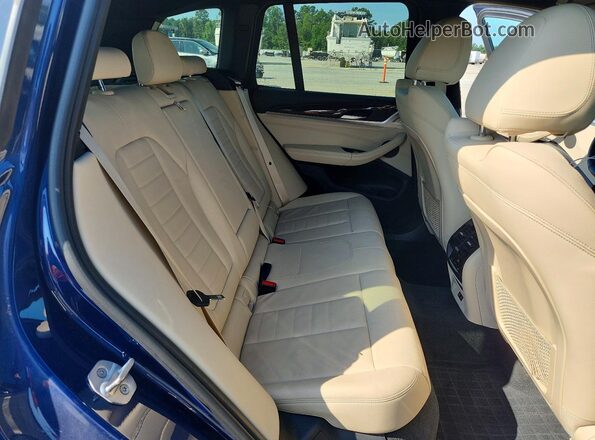 5UXTY5C00M9E37840 2021 BMW X3 Blue Rear interior view