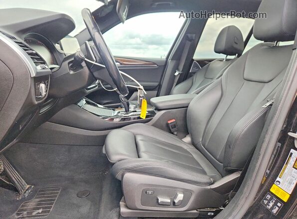 5UXTY5C01LLE58391 2020 BMW X3 Black Front interior view