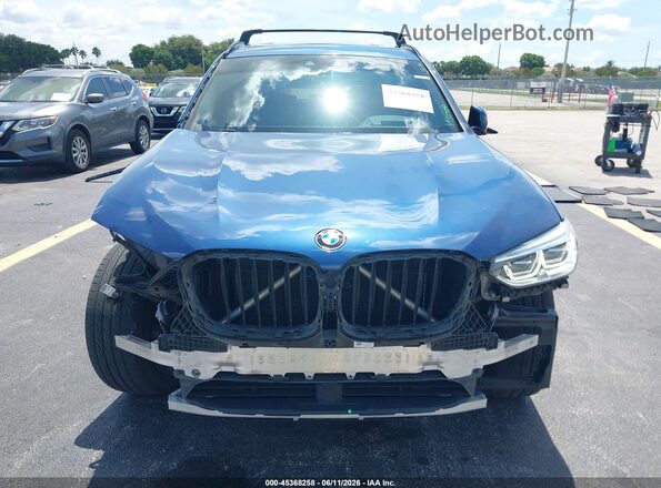 5UXTY5C03L9D18680 2020 BMW X3 Blue Вид задньої частини салону