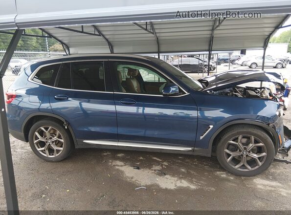 5UXTY5C05M9G03690 2021 BMW X3 Blue Vista interior trasera