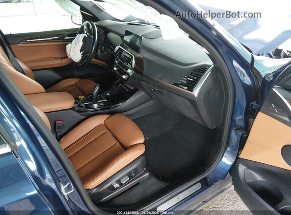 5UXTY5C05M9G03690 2021 BMW X3 Blue Vista interior delantera