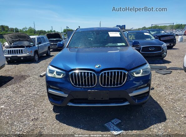 5UXTY5C06M9F84809 2021 BMW X3 Blue Առջևի վահանակի տեսք