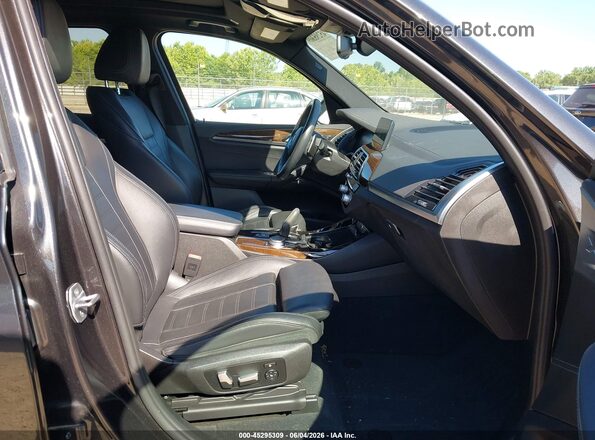 5UXTY9C04L9C16229 2020 BMW X3 Black Front interior view