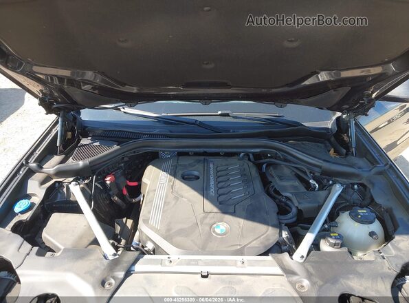 5UXTY9C04L9C16229 2020 BMW X3 Black Rear view