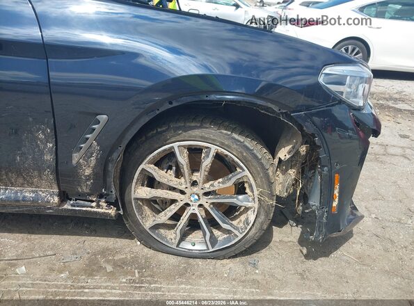 5UXTY9C04M9F40086 2021 BMW X3 Black Widok z przodu