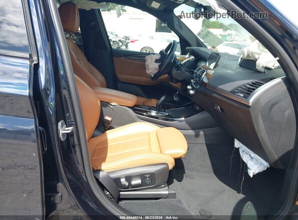 5UXTY9C04M9F40086 2021 BMW X3 Black Widok wnętrza z przodu