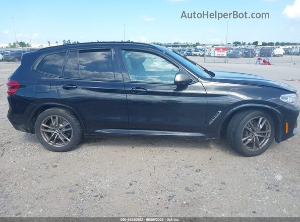 5UXTY9C08M9D81749 2021 BMW X3 Black Widok wnętrza z tyłu