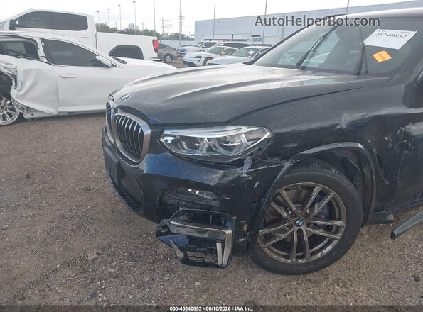 5UXTY9C08M9D81749 2021 BMW X3 Black Widok z przodu
