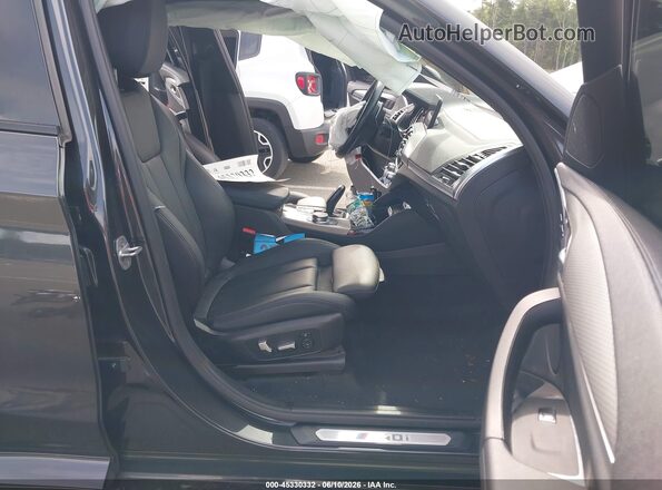 5UXUJ5C56KLJ64209 2019 BMW X4 Серый Вид салона спереди