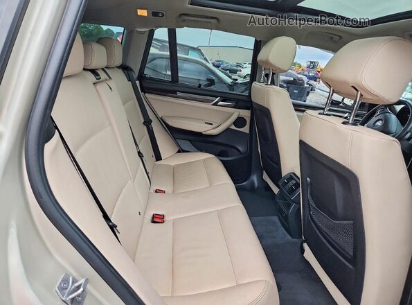 5UXWX9C50H0T09205 2017 BMW X3 Tan Вид задньої частини салону