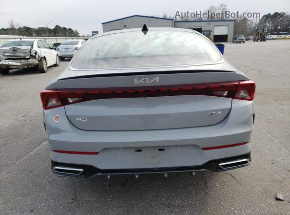 5XXG64J27RG257558 2024 KIA K5 Gray Հետևի տեսք