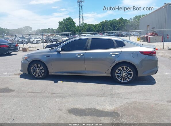 5XXGV4L22GG091172 2016 KIA OPTIMA Gray Vista interior trasera