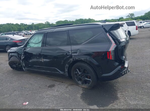 5XYADFS58TG008382 2026 KIA EV9 Black Вид задньої частини салону
