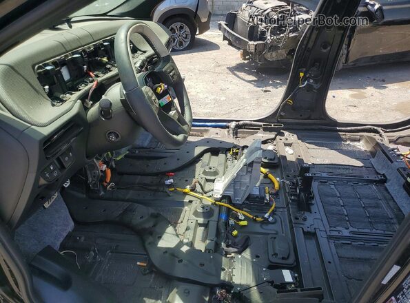 5XYC4DJC4SG009802 2025 KIA EV6 Charcoal წინა სალონის ხედი