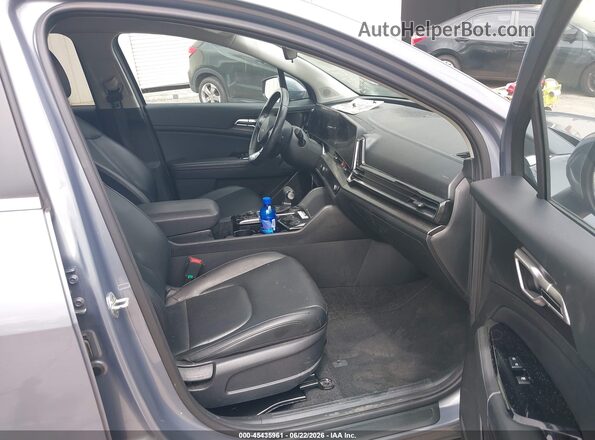 5XYK33AF4PG079696 2023 KIA SPORTAGE Light Blue Widok wnętrza z przodu