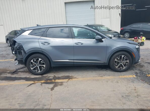 5XYK33AF4PG079696 2023 KIA SPORTAGE Light Blue Widok wnętrza z tyłu