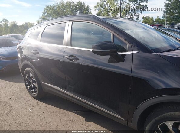 5XYK33DF2SG305979 2025 KIA SPORTAGE Black Widok wnętrza z tyłu